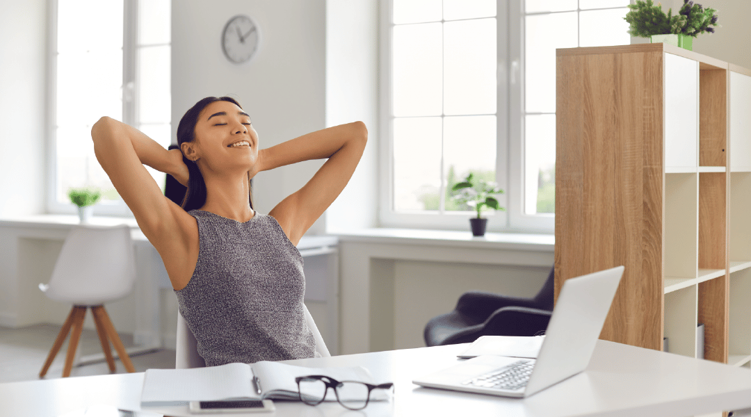 Woman Relaxed at Desk