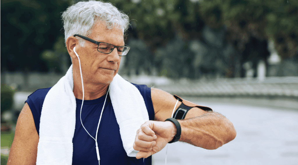 Man Checking Wearable Device Running
