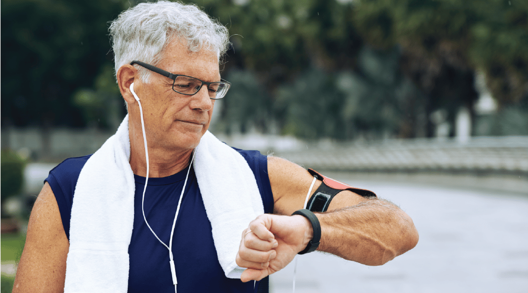 Man Checking Wearable Device Running