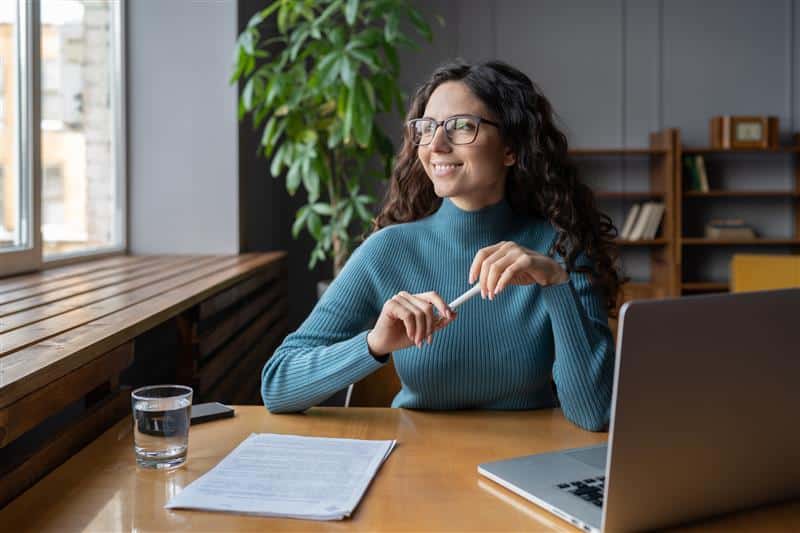 Smiling woman working at desk