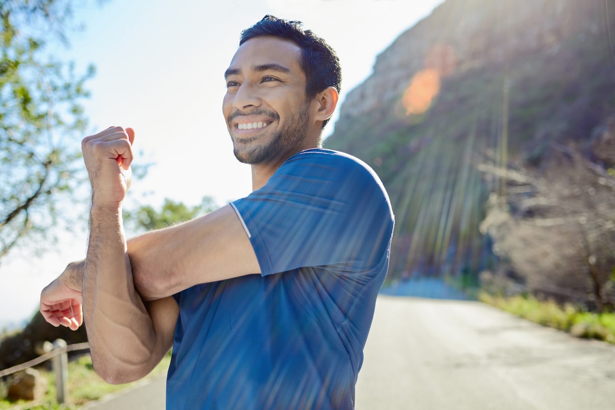Smiling man working out