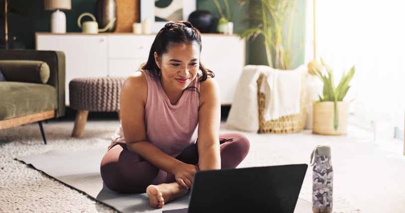 woman stretching at home