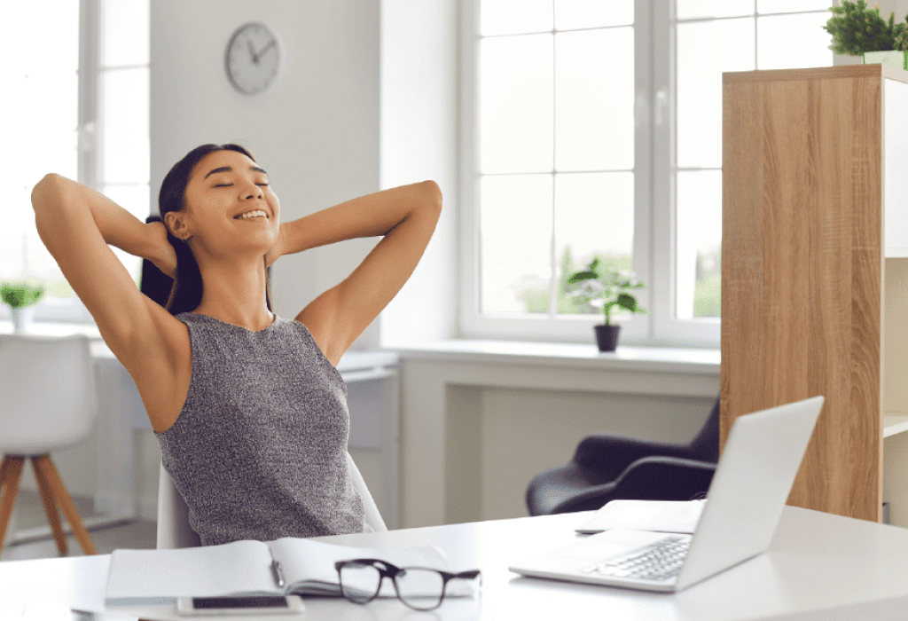 Woman Relaxed at Desk