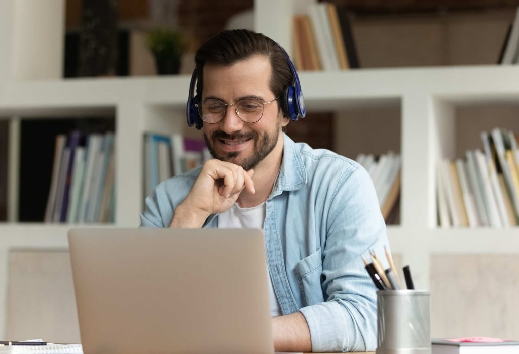 Hybrid employee working at computer