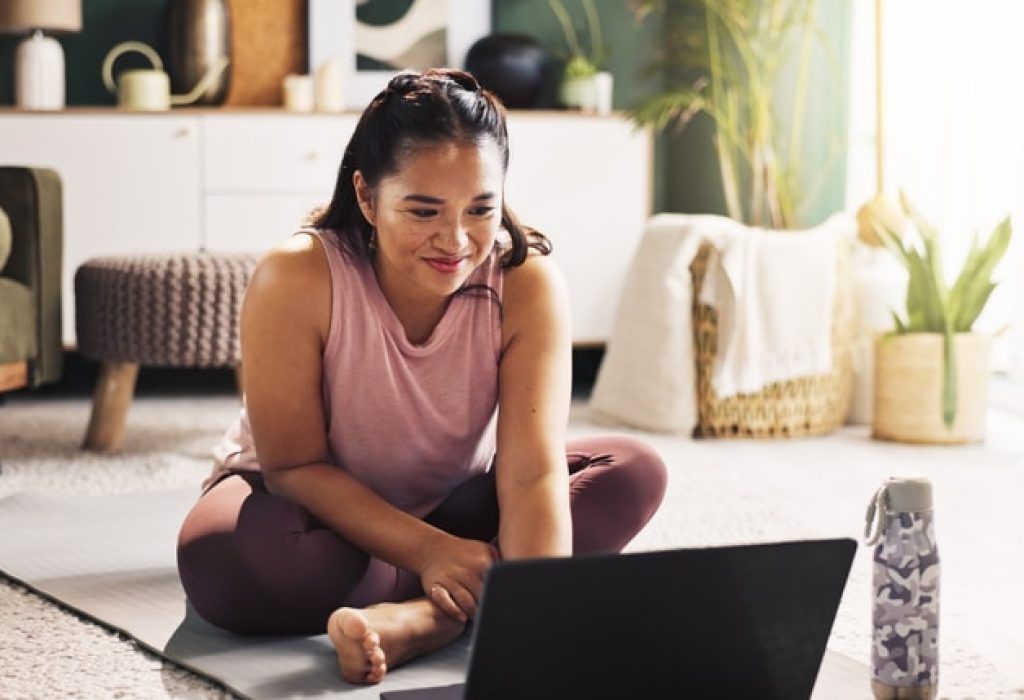 woman stretching at home